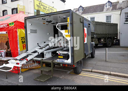 land rover battlefield ambulance at british army medical regiment recruiting stand at an outdoor event Stock Photo