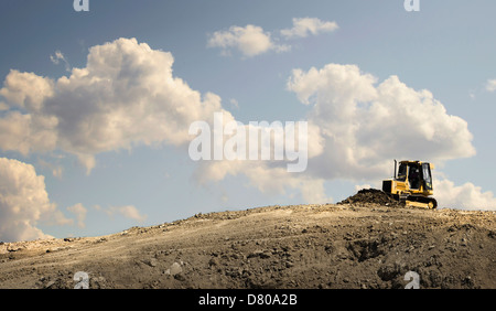 Bulldozer working in quarry Stock Photo