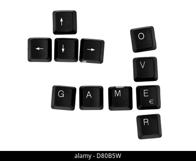 GAME OVER sign written on a keyboard. Isolated on a white background. Stock Photo