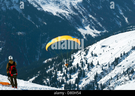 Paraglider, just taken off,  above St Anton, in the Austrian Tyrol Stock Photo