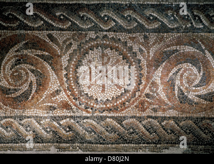 Roman mosaic depicting the Chi-Rho symbol with alpha and omega. Found in Barcelona. Museum of History. Barcelona. Spain. Stock Photo