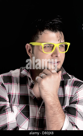 Man thinking on black background Stock Photo