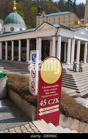 Sign directing to Lazenske Oplatky the spa wafer shop at Mirove namesti square Marianske Lazne aka Marienbad spa town Czech Rep Stock Photo