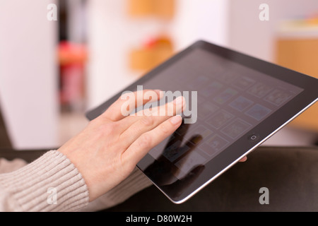 Female holding digital tablet, closeup Stock Photo