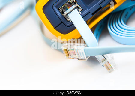 network cable tester for RJ45 connectors with cable connected for ...