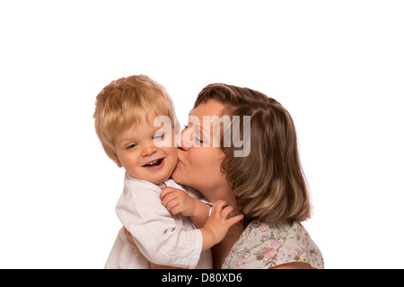 Happy mother embracing her little boy. Isolated on white background Stock Photo