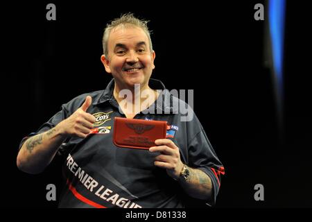 16.05.2013 London, England. Phil Taylor  interacts with the crowd and shows his bentley dart case.  The McCoy's 2013 PDC Premier League Darts Play-Offs from The O2 Arena. Stock Photo