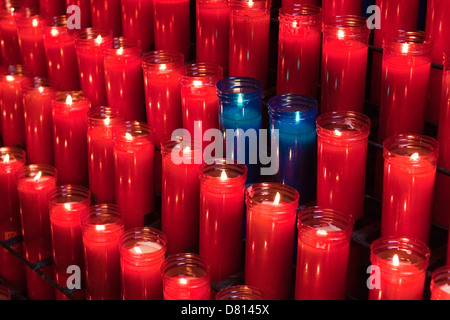 Rows of Nova Votive Prayer Candles in Church Stock Photo