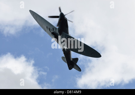 Spitfire of the Battle of Britain Memorial flight banking over Derwent reservoir on the 16th May 2013 Stock Photo