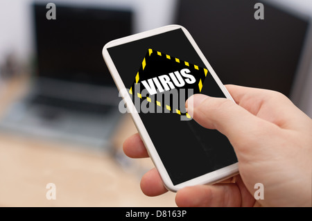 Man's Hand Touching Smartphone With Virus Alert on Display Stock Photo