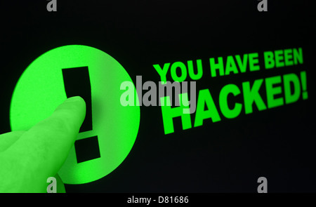 Online Shopping - Finger Pushing You Have Been Hacked Sign On Touchscreen Stock Photo