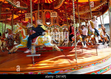 Merry go Round, traditional fair ground ride, South Bank, London, England Stock Photo