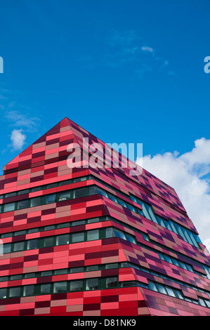 A red tiled contemporary building on the Jubilee Campus at Nottingham University against a blue sky. UK. Stock Photo