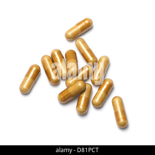 brown powder capsules cut out onto a white background Stock Photo