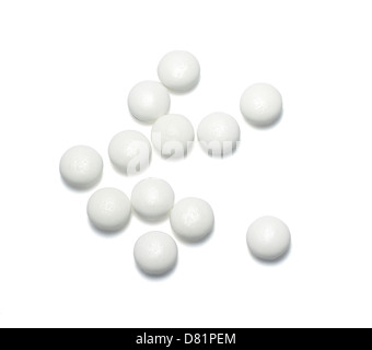 white pills cut out onto a white background Stock Photo