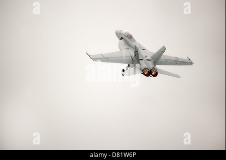 An F/A-18 fighter jet goes through its paces at an air show in Australia. Stock Photo