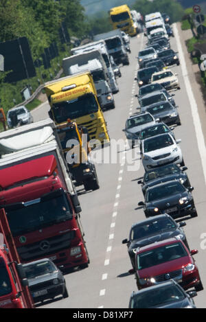 Numerous vehicles are stuck in traffic at the A3 motorway near Regensburg, Germany, 17 May 2013. At the beginning of Pentecost holidays, the streets and airports in Bavaria are crowded with travelers. Photo: ARMIN WEIGEL Stock Photo