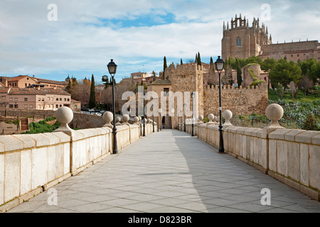 Toledo - Outlook form San Martin s bride or Puente de san Martin to Moanastery of saint John of the King in morning light Stock Photo
