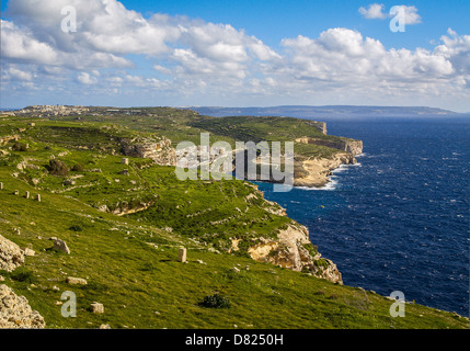 Xlendi Bay cliffs on Gozo Stock Photo