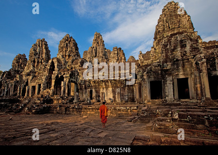 Chasing the light at Temple Bayon in Cambodia, which is part of Angkor Wat. Stock Photo