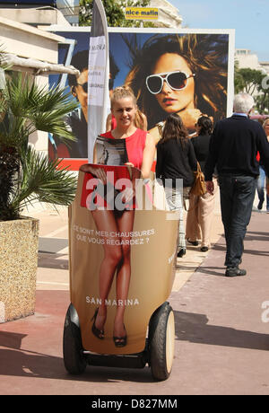 PROMOTIONAL WOMAN ON A SEGWAY MAGNUM. PHOTOCALL. CANNES FILM FESTIVAL 2013 CANNES  FRANCE 17 May 2013 Stock Photo