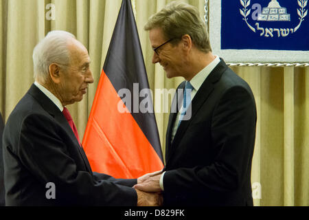 Jerusalem, Israel. 17th May 2013. Israeli President Shimon Peres (L) shakes hands with Minister of Foreign Affairs of the Federal Republic of Germany, Guido Westerwelle (R), at the onset of a diplomatic work meeting at the Presidents' Residence. Jerusalem, Israel. 17-May-2013.  Israeli President Shimon Peres hosts Minister of Foreign Affairs of the Federal Republic of Germany, Guido Westerwelle, for a diplomatic work meeting at the Presidents' Residence. Credit:  Nir Alon / Alamy Live News