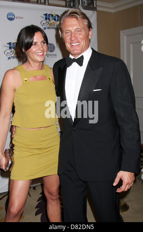 Dolph Lundgren and Guest 22nd Annual Night Of 100 Stars Oscar Viewing Gala held at The Beverly Hills Hotel Los Angeles, Stock Photo