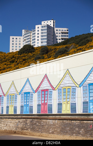 Painting of the beach huts on the side of building between Bournemouth and Boscombe piers Stock Photo