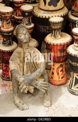 Drums and wood carving, Ghana Stock Photo