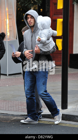 Luis Suarez with his wife Sofia and daughter Delfina enjoyed an early Valentine's lunch at the San Carlo restaurant in Stock Photo