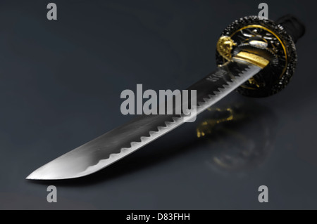 Short samurai sword Japanese Tanto Closeup of a blade isolated with clipping path Stock Photo