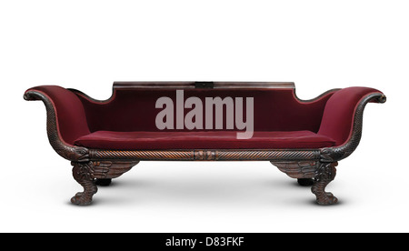 Antique victorian wooden dark red sofa isolated with clipping path on white background Stock Photo