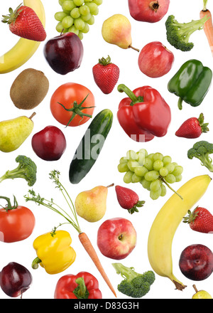 Colorful pattern of fruits and vegetables falling over white background Stock Photo