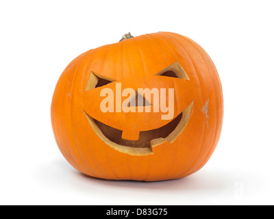 Carved smiling pumpkin. Jack-o'-lantern Halloween symbol. Isolated on white background. Stock Photo