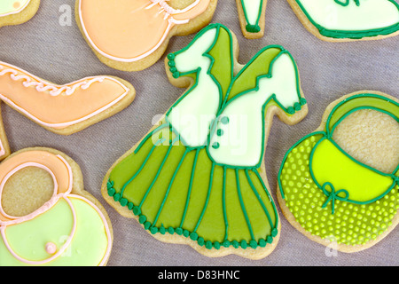 Iced fashion cookies: shortbread biscuits decorated as fashion items. Stock Photo