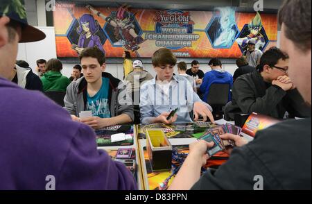 Participants of the German Yu-Gi-Oh! Trading Card Game Championships play against each other in Schkeuditz, Germany, 18 May 2013. More than 800 players competed against each other to win the title of German champion of the Japanese card game. The best 32 players achieved a qualification for the European Championships at the end of June i n Frankfurt (Main). Photo: Hendrik Schmidt/dpa Stock Photo