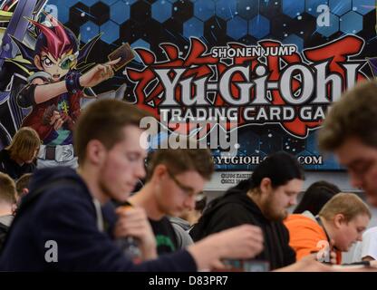 Participants of the German Yu-Gi-Oh! Trading Card Game Championships play against each other in Schkeuditz, Germany, 18 May 2013. More than 800 players competed against each other to win the title of German champion of the Japanese card game. The best 32 players achieved a qualification for the European Championships at the end of June i n Frankfurt (Main). Photo: Hendrik Schmidt/dpa Stock Photo