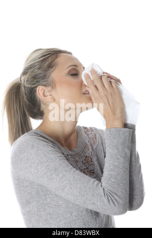 Model Released. Young Woman Sneezing Stock Photo