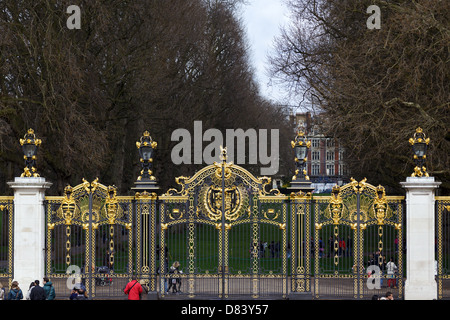 Green park metallic gate and fence in London, United kingdom Stock Photo