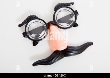 Groucho marx glasses on a white background Stock Photo