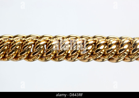 Close up of Gold chain on the White background Stock Photo