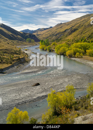 Autumn view looking upstream on the Shotover River and Skippers Canyon, near Queenstown, Otago, New Zealand. Stock Photo