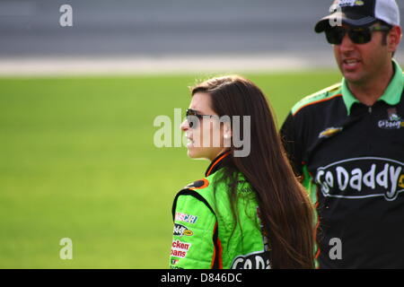 Charlotte, USA. 17th May, 2013. Danica Patrick looks down put road as cars begin to take their turn on the track during qualifying for the Sprint Showdown at Charlotte Motor Speedway on May 17, 2013. Credit:  Christopher Kimball/Alamy Live News Stock Photo