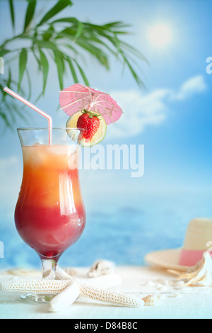 Cocktail on the beach with starfish blurred background concept Stock Photo