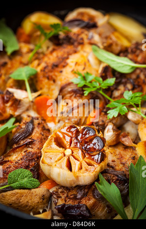 Roasted roasted rabbit on vegetables Stock Photo