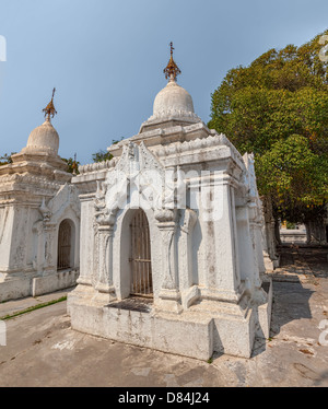 The World's Biggest Book in Kuthodaw Pagoda with 729 parts (stone inscriptions) in white stupas Stock Photo