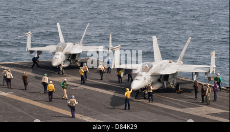 Two F/A-18 Super Hornet aircraft on the flight deck of USS George H.W. Bush. Stock Photo