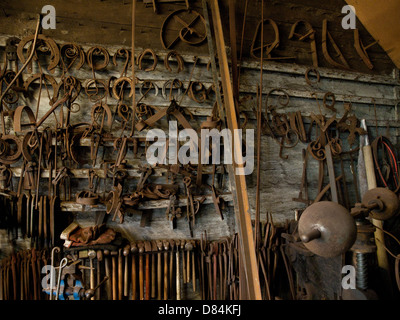 The interior of an old English blacksmiths Stock Photo