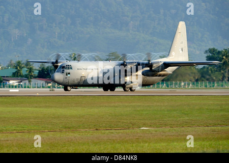 March 26, 2013 - A C-130J Super Hercules of the Royal Malaysian Air Force prepares to take off from Langkawi Airport, Malaysia. Stock Photo