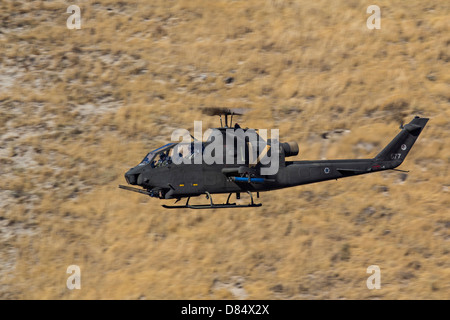 An AH-1F Tzefa of the Israeli Air Force flying a training sortie over Israel. Stock Photo